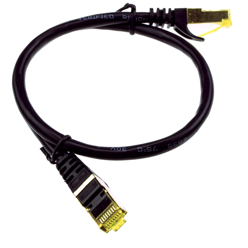 Close-up view of the metal shielded RJ45 connector and individual pair foil wrapping on a Cat7 patch cable.