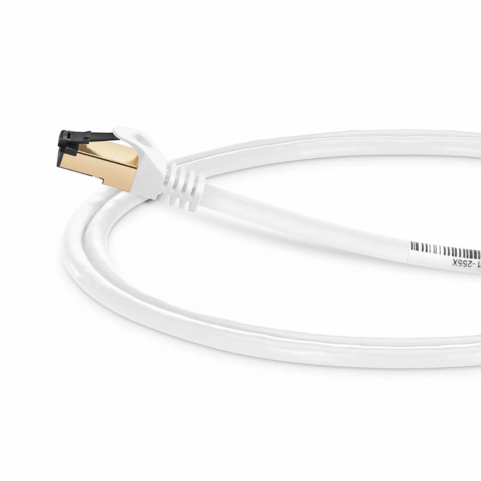 Close-up view of the protective snagless strain relief boot and shielded RJ45 plug on a Cat8.1 LSZH patch cable.