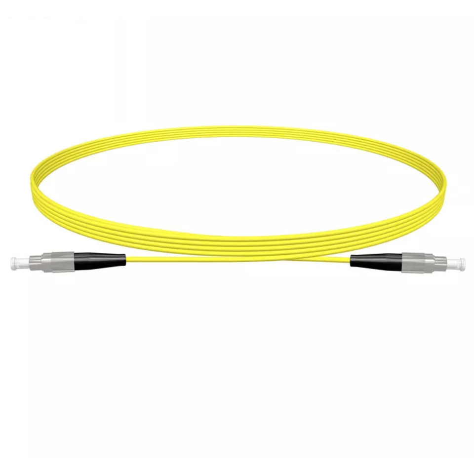 Close-up of FC/UPC connectors on single mode simplex fiber optic jumper cable