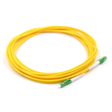 Close-up of green LC/APC angle polished connectors on single mode duplex fiber patch cable
