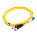 Close-up of blue LC/UPC and threaded FC/UPC hybrid connectors on single mode duplex fiber patch cable