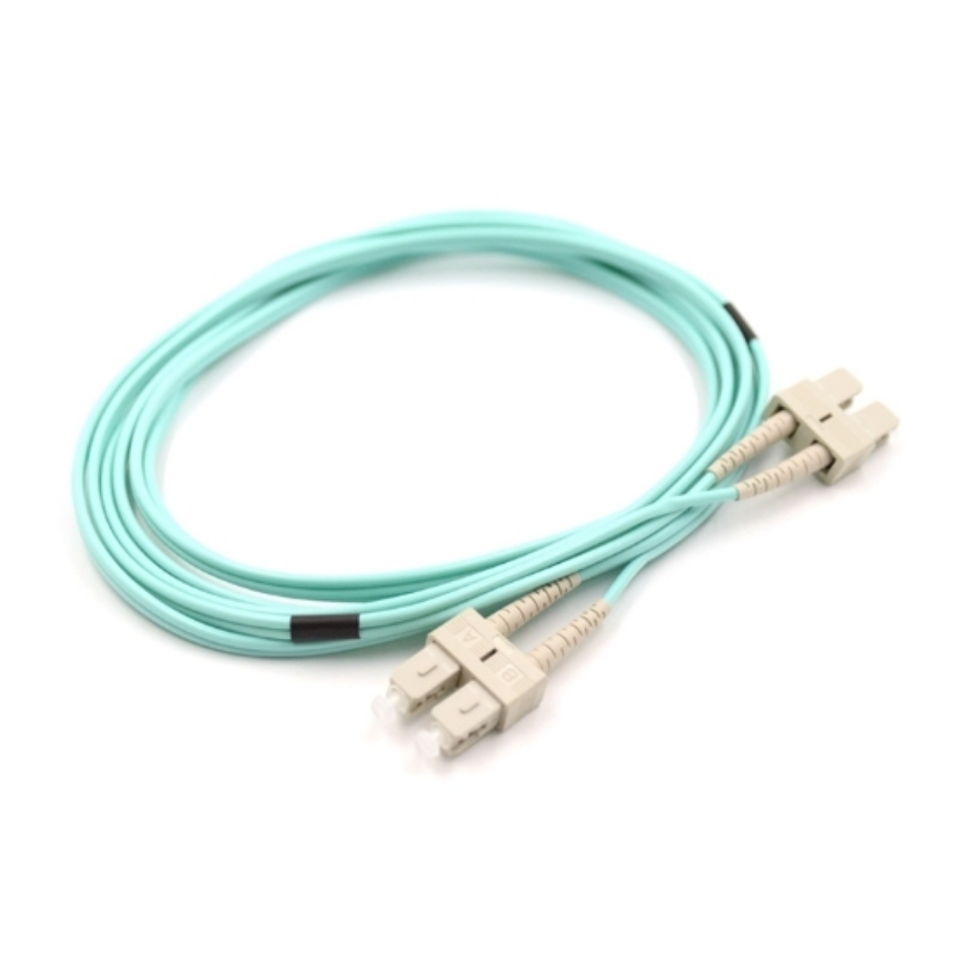Close-up of aqua-colored SC/UPC duplex connectors on OM3 multimode fiber patch cable